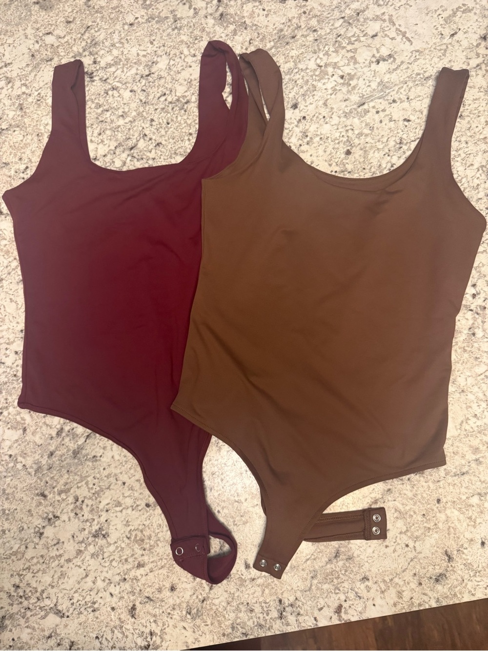 ReoRia One-Piece Bodysuits in Burgundy and Brown. Lot of 2, size medium